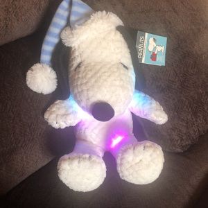 NWT peanuts SNOOPY Holiday plush. Lights up & musical plays 3 songs! Watch video